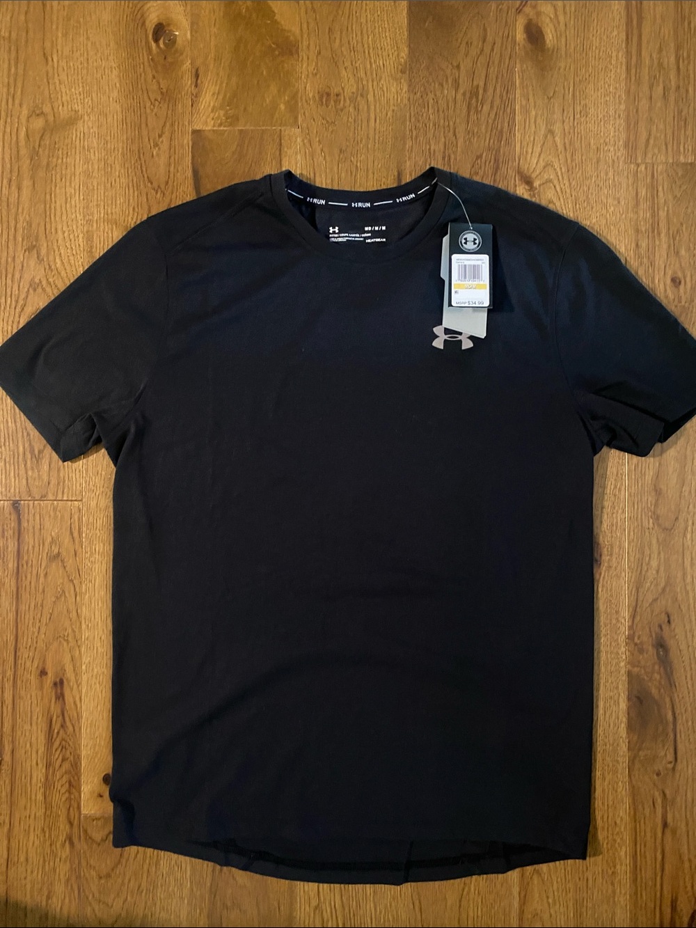 Men’s size medium Under Armour Heatgear shirt. Brand new with tags.